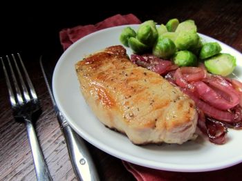 Soaking pork chops in a flavorful, beery brine results in most, tender meat. Photo by Fran Hill.