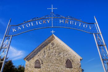 “Katolicky Hrbitov” means “Catholic Cemetery” in Czech.