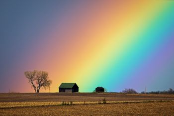 Rainbow in rural Minnehaha County shot with a telephoto lens.