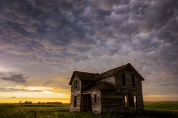 Mammatus clouds over an abandoned farmhouse in rural McCook County.