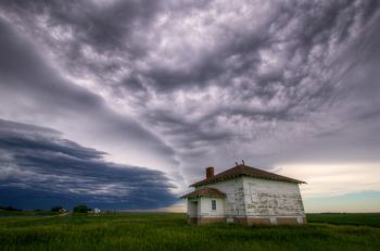An approaching storm over an old country schoolhouse in southern Day County.
