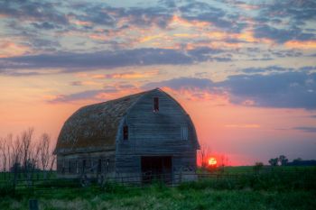 An unused barn at sunset along a county road in Hutchinson County.
