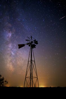 A lone windmill with the stars above west of Watertown.