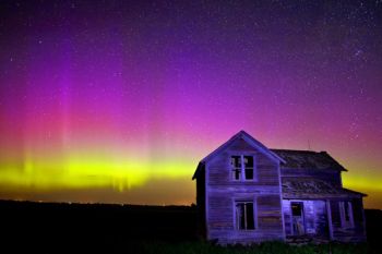 Northern lights above an abandoned farm house in McCook County.