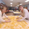 Susan Schroeder and Barb Perk turn drying noodles in Tabor s Legion Hall.