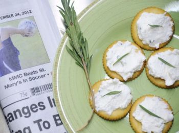 Creamy homemade goat cheese flavored with garlic, lemon and rosemary makes a tasty spread for crackers. Photo by Bernie Hunhoff.