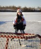 Brecken Glanzer, 5-year-old, takes a break during an informal hockey game on Ravine Lake.
