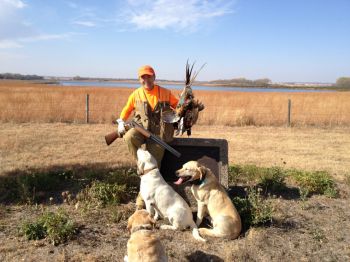 Copper and crew celebrating a successful Terry Redlin hunt.