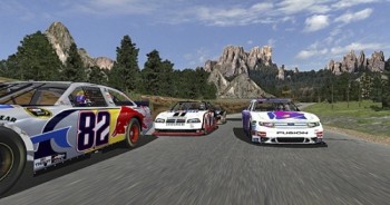 “Virtual” NASCAR stock cars race by the Needles rock formations in Custer State Park in this video game version of the famous highway.