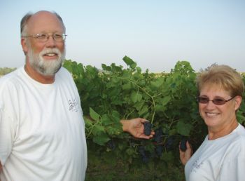 Jim and Nancy Schade at their Volga vineyard.