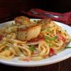 Sweet scallops over linguini could win your Valentine s heart.