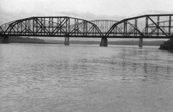 The Chicago and Northwestern Railroad bridge and the old highway bridge between Pierre and Fort Pierre marked the end of the raft journey.