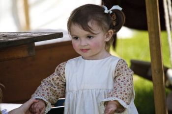 A young helper in the military campgrounds.