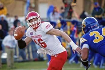 USD quarterback Josh Vander Maten scrambles for yardage.