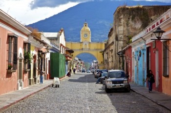 Cobblestone streets in old town Antigua. Volcán de Agua (or water volcano) is the background.