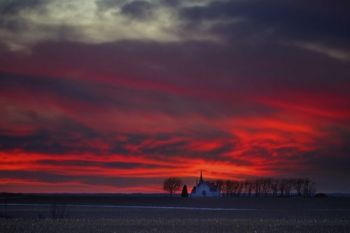 Post-sunset colors above Skrefsrud Lutheran Church east of Centerville.