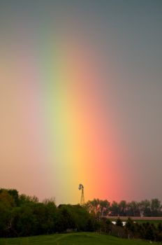 A rainbow lights up a northwest Minnehaha County windmill.