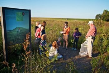 A small group of Monarch butterfly enthusiasts gather to help tag.