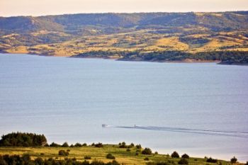Water skiing, as seen from the eastern bluffs of Snake Creek Recreation Area. Click to enlarge photos.
