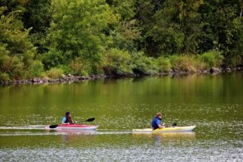 Kayakers enjoying the calm waters.