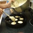 Add the batter to the preheated æbleskiver pan, filling the indentations about 2/3rds full.