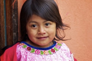 A Mayan girl waiting for class to begin at The Learning Center of Cruz Blanca, Guatemala. Click to enlarge pictures.