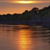 Sunset over a bend in the Missouri River, which borders the park.