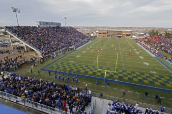 The view of the game's kickoff from atop the scoreboard.