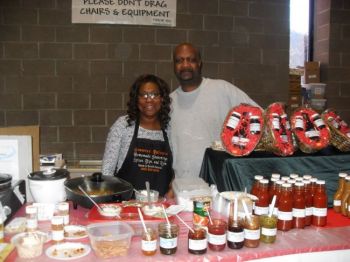 Angelique and Joe Mills giving out samples in Hot Springs.