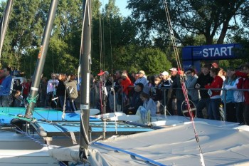 Spectators watch the 1/4 mile swim from Hobie Cat Beach.