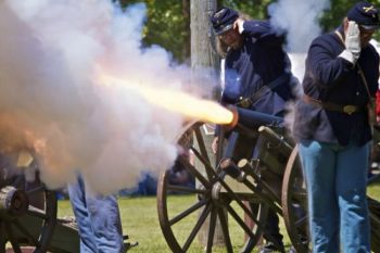 The boom of the big cannon is too much for these soldiers.