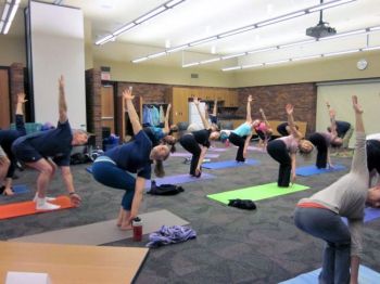 Sean Gallup from The Dharma Room teaches advanced yoga at the 2012 Sioux Falls Yoga Day.