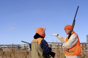 Landowner Nick Nemec explains his bird-surrounding plan to Lee Schoenbeck.