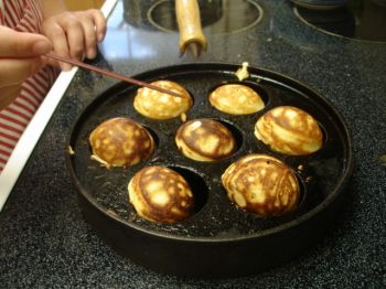 Æbleskiver require a special pan. Photo by Chris Moore.