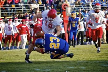 ...But the ball is ripped away by a USD defensive back.