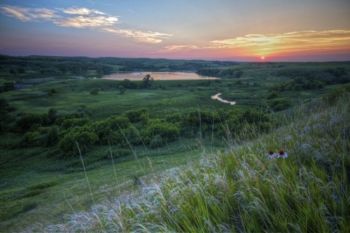 Sunset over the main dam in early July.