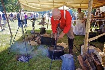 Camp cooking the old-fashioned way.