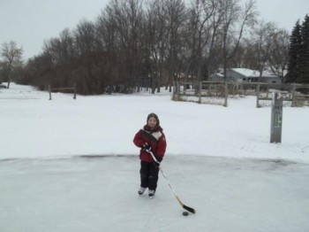 Success! A satisfied great-nephew enjoys the Schoenbeck Ice Rink.