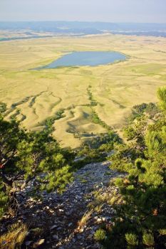 View from the top looking southwest over Bear Butte Lake and towards Fort Meade and Sturgis.