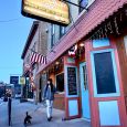 One of the West’s most charming and unusual shopping districts can be found on North River Street in Hot Springs (pop. 3,500). A row of beautiful, historic sandstone storefronts follows the east side of the street, and on the west is the stone wall of Fall River Canyon.