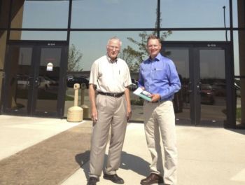 Daktronics helps sports teams around the world keep score. The Brookings company's co-founder Al Kurtenbach, left, is pictured here with <i>South Dakota Magazine</i> publisher Bernie Hunhoff. Photo by Heidi Marsh.