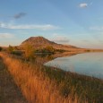 The sun sets on the south side of Bear Butte Lake.