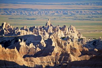 More badland formations with the White River valley in the far distance.