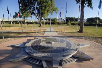 City officials erected a monument celebrating Belle Fourche's status as Center of the Nation, but the real spot lies north of town. SD Tourism photo.