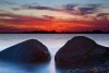 Editor Bernie Hunhoff chose this sunset on Clear Lake near Humboldt.  I just talked to an Easterner who was shocked that our  land-locked  state had beaches, sailing, fishing and water sports. Not only does South Dakota have water galore, but we have scenery like this that is as beautiful as anything in the country.  Photo by Christian Begeman.