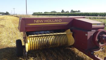 Carl, a former engineer for New Holland, was thrilled to see this old baler south of Bridgewater.