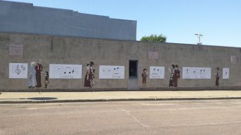 Salem’s musical mural reads, “Grandpa, tell me ‘bout the good old days.”