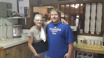 Lavon Zelmer of Bridgewater's Wildcat Inn Cafe poses with employee Jerico Shape.