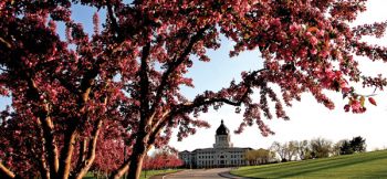 Blooming lilac and crab apple trees provide a splash of color to the state capitol grounds in Pierre. Photos by Scott Howard/S.D. Tourism.