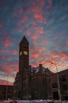The Old Courthouse Museum’s clock tower provides a historic and striking foreground for the colorful clouds.